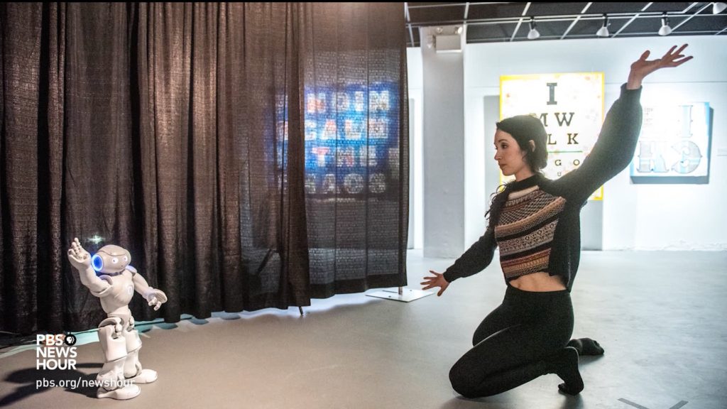 Robot mirrors dancer Catie Cuan's arm movements, in an attempt to look more human.jpg