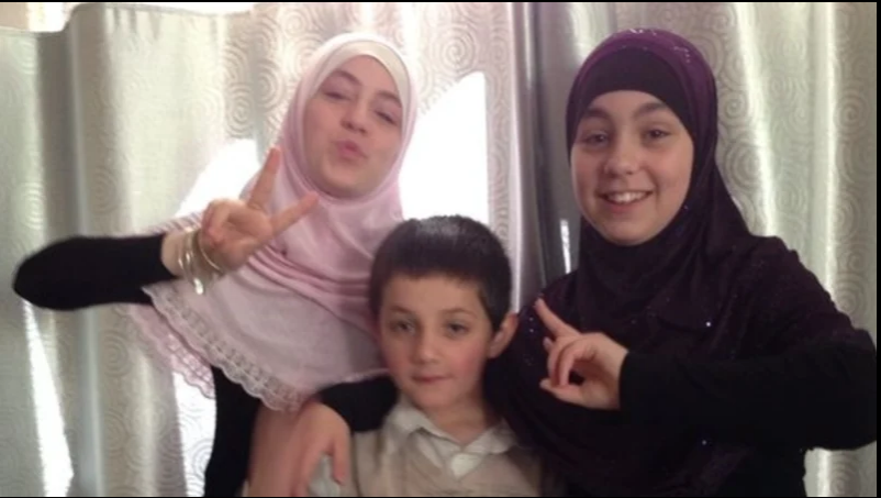 14 year old widow, orphan and mother Zaynab Sharrouf, and two of her younger siblings.png