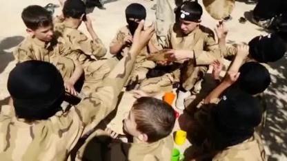 'Zarqawi cubs' -- boys being trained to be jihadist fighters, from a video uploaded by ISIL.jpg