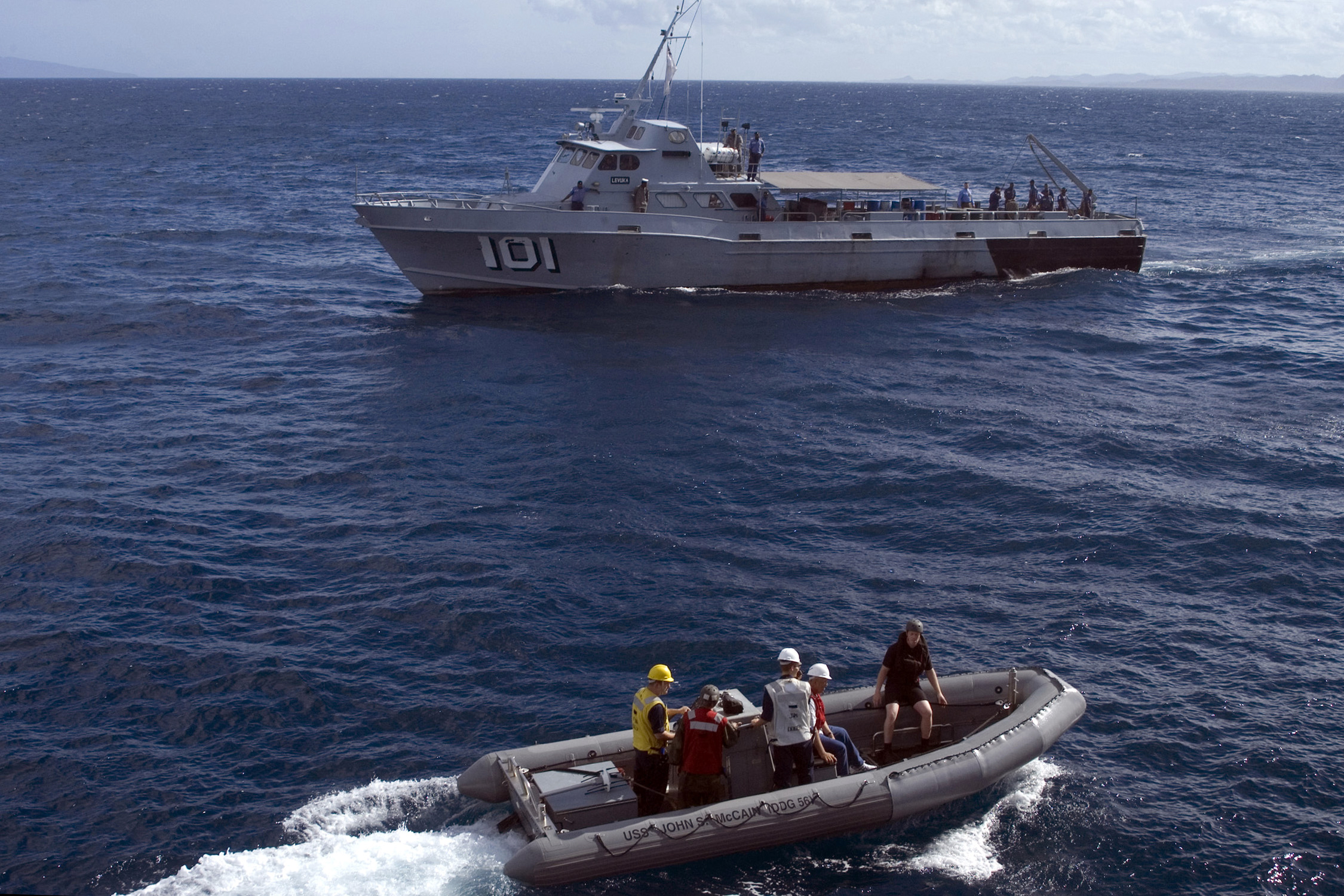 US Navy 080729-N-9123L-004 A rigid hull inflatable boat from the guided-missile destroyer USS John S. McCain (DDG 56) approaches the Fijian coastal patrol boat Levouka during an emergency medical evacuation.jpg